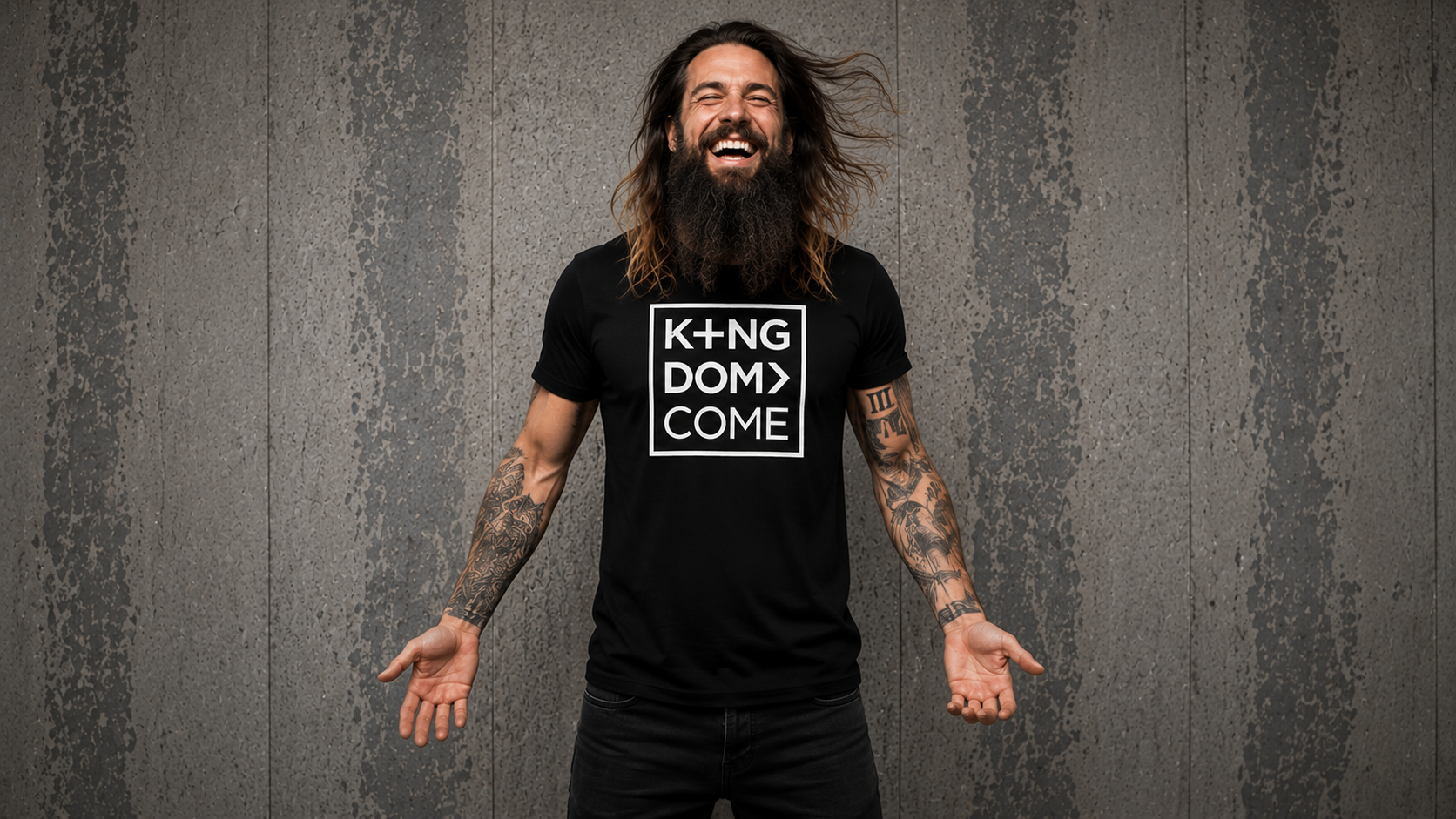 Man wearing the Kingdom Come logo tee